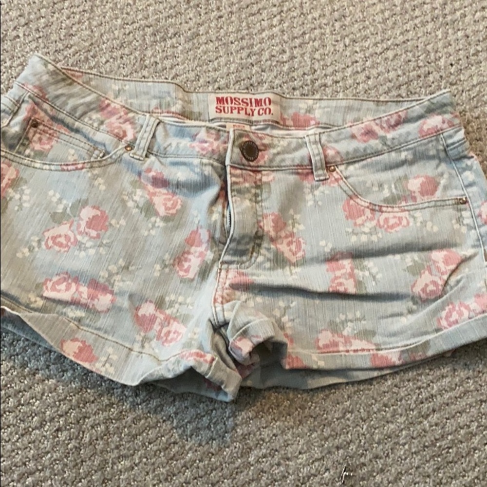 Floral denim shorts.